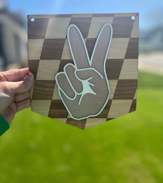 Checkered “Peace Sign” Nursery Decor